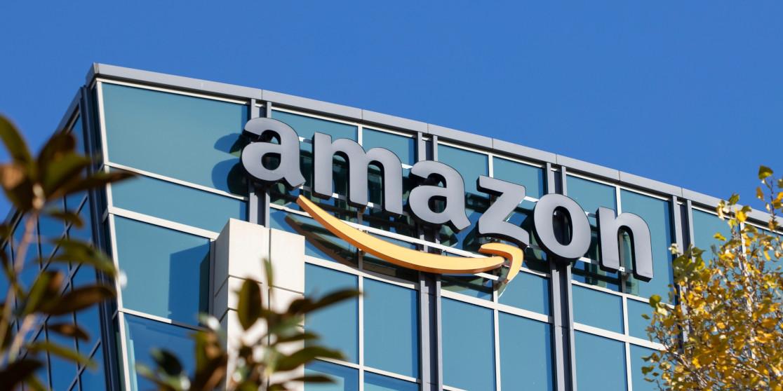 A photo of the outside of an Amazon building on a sunny day.